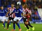Clayton Donaldson of Birmingham City tangles with Wes Brown of Sunderland during the Capital One Cup second round match between Birmingham City and Sunderland at St Andrews on August 27, 2014