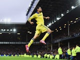 Diego Costa of Chelsea celebrates scoring his team's sixth goal during the Barclays Premier League match between Everton and Chelsea at Goodison Park on August 30, 2014