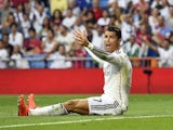 A frustrated Cristiano Ronaldo sits on the pitch during Real Madrid's encounter with Cordoba on August 25, 2014