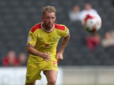 Danny Green of MK Dons in action during the pre-season friendly against Leicester City at Stadium mk on August 4, 2014