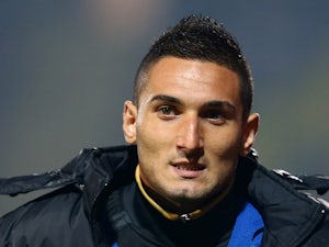 Federico Macheda of Doncaster Rovers warms up during the Sky Bet Championship match between Watford and Doncaster Rovers at Vicarage Road on September 17, 2013