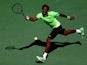 Gael Monfils of France returns a shot to Alejandro Gonzalez of Columbia during their men's singles second round match on Day Five of the 2014 US Open at the USTA Billie Jean King National Tennis Center on August 29, 2014