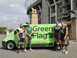 Players from Harlequins, London Irish, Saracens and London Wasps pose in front of a Green Flag van at Twickenham ahead of the 2014-15 Aviva Premiership season
