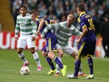 Agim Ibraimi of NK Maribor vies with Jo Inge Berget of Celtic during the UEFA Champions League Qualifying Play-Offs Round, Second Leg Match on August 26, 2014