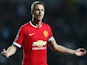 Jonny Evans of Manchester United shows his frustration during the Capital One Cup Second Round match against MK Dons on August 26, 2014