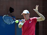 Kevin Anderson of South Africa returns a shot to Jerzy Janowicz of Poland during their 2014 US Open men's singles match at the USTA Billie Jean King National Tennis Center on August 29, 2014 