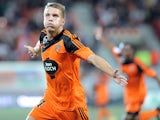 Lorient's French forward Valentin Lavigne jubilates after scoring a goal during the French L1 football match Lorient vs Guingamp on August 30, 2014