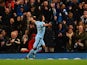 Manchester City's Argentinian striker Sergio Aguero celebrates scoring their third goal in front of the City supporters during the English Premier League football match between Manchester City and Liverpool at the Etihad Stadium in Manchester, north-west 
