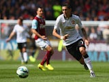 Angel di Maria of Manchester United runs with the ball during the Barclays Premier League match between Burnley and Manchester United at Turf Moor on August 30, 2014