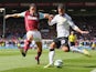  Robin van Persie of Manchester United and Michael Duff of Burnley battle for the ball during the Barclays Premier League match between Burnley and Manchester United at Turf Moor on August 30, 2014