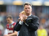Manchester Uniteds Dutch manager Louis van Gaal applauds the fans as he leaves the pitch after the final whistle in the English Premier League football match between Burnley and Manchester United at Turf Moor in Burnley, north west England on August 30, 2