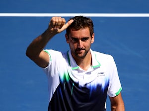 Cilic thrashes Federer to reach first Slam final
