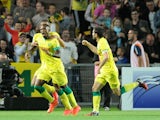 Nantes' Togolese forward Serge Gakpe celebrates with teammates after scoring a goal during the French L1 football match between Nantes (FCN) and Montpellier (MHSC) on August 30, 2014 