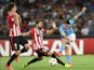 Mikel Balenziaga of Athletic Bilbao and Marek Hamsik of Napoli in action during the first leg of UEFA Champions League qualifying play-offs round match between SSC Napoli and Athletic Club on August 19, 2014