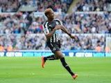 Rolando Aarons of Newcastle United celebrates scoring their second goal during the Barclays Premier League match between Newcastle United and Crystal Palace at St James' Park on August 30, 2014