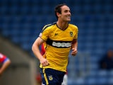 Danny Hylton of Oxford United celebrates after scoring his sides third goal during the Sky Bet League Two match between Oxford United and Dagenham & Redbridge at Kassam Stadium on August 30, 2014