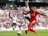 Raheem Sterling of Liverpool scores the opening goal during the Barclays Premier League match between Tottenham Hotspur and Liverpool at White Hart Lane on August 31, 2014