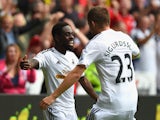 Swansea player Nathan Dyer celebrates after opening the scoring during the Barclays Premier League match between Swansea City and West Bromwich Albion at Liberty Stadium on August 30, 2014 