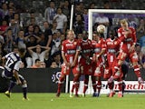 Toulouse's French Moroccan midfielder Adrien Regattin scores a goal during the French L1 football match Toulouse (TFC) against Evian Thonon Gaillard (ETGFC) on August 30, 2014