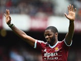 Alex Song of West Ham United acknowledges the fans as he joins the club on loan prior to the Barclays Premier League match between West Ham United and Southampton at Boleyn Ground on August 30, 2014