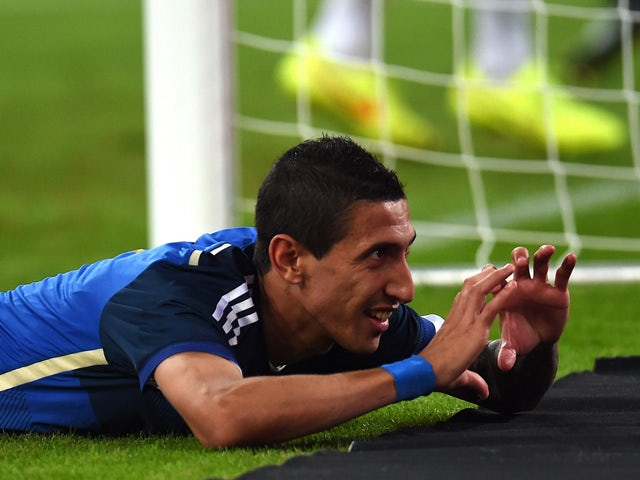 Argentina's midfielder Angel Di Maria celebrates after scoring during a friendly football match between Germany vs Argentina in Duesseldorf, Germany, on September 3, 2014