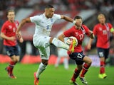 England's Alex Oxlade-Chamberlain controls the ball during the international friendly football match between England and Norway at Wembley Stadium in north London on September 3, 2014