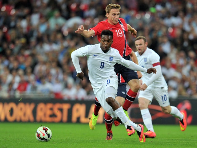 England's Daniel Sturridge vies with Norway's Ruben Yttergard Jenssen during the international friendly football match between England and Norway at Wembley Stadium in north London on September 3, 2014