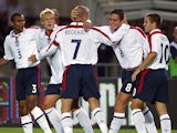 England's captain David Beckham celebrates the opening goal scored by Frank Lampard at the Ernst-Happel stadium in Vienna 04 September 2004