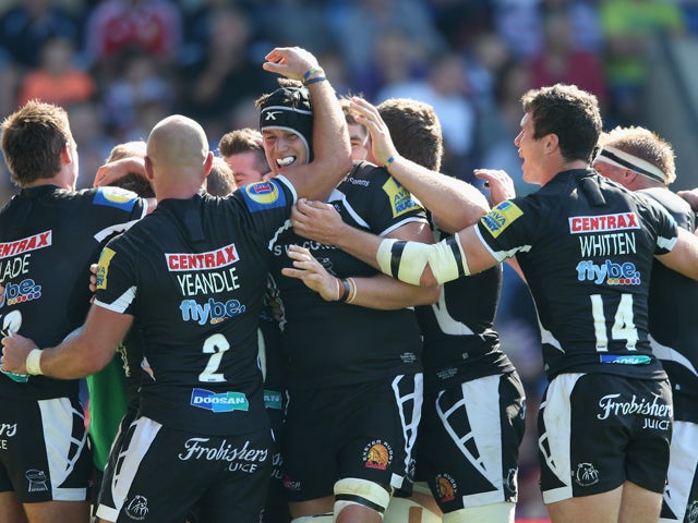 Exeter Chiefs celebrate after a try in their 52-0 victory during the Aviva Premiership match between London Welsh and Exeter Chiefs at the Kassam Stadium on September 7, 2014