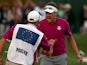 Ian Poulter of Europe celebrates with his caddie Terry Mundy after making birdie on day two of the 2012 Ryder Cup at Medinah on September 29, 2012