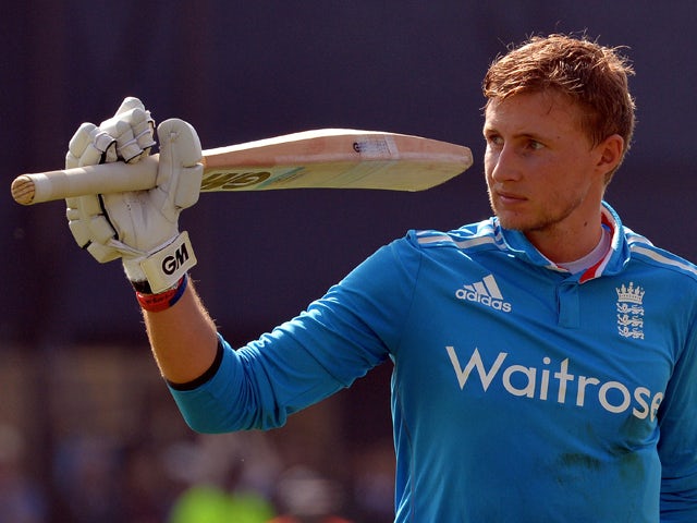 England's Joe Root gestures to the crowd as he walks off having lost his wicket for 113 during the fifth one-day international (ODI) cricket match between England and India at Headingley in Leeds, northern England, on September 5, 2014