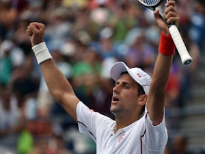 Djokovic secures Murray clash