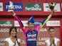 Lampre's Polish cyclist Przemyslaw Niemiec (C) celebrates his victory on the podium of the 15th stage of the 69th edition of 'La Vuelta' Tour of Spain, a 152,2 km ride on September 7, 2014