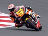 NGM Forward Racing rider Italy's Simone Corsi rides his Kalex during the qualifying session for the Moto2 race at the motorcycling British Grand Prix on August 30, 2014