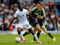 Souleymane Doukara of Leeds in action with Dean Whitehead of Middlesbrough during the Sky Bet Championship match between Leeds United and Middlesbrough at Elland Road on August 16, 2014