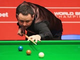 Stephen Maguire of Scotland in action against Ryan Day of Wales during day one of the The Dafabet World Snooker Championship at Crucible Theatre on April 19, 2014