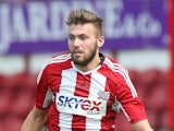 Stuart Dallas of Brentford in action during the Pre Season Friendly match between Brentford and Crystal Palace at Griffin Park on August 2, 2014