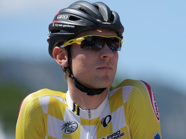 Tejay van Garderen of the United States riding for the BMC Racing Team arrives at the start in the overall race leader's yellow jersey on August 24, 2014