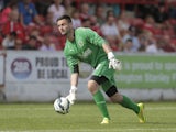 Alex Cisak of Burnley in action during the pre-season friendly between Accrington Stanley and Burnley at the Store First Stadium on July 26, 2014