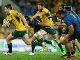 Bernard Foley of the Wallabies runs the ball during The Rugby Championship match between the Australian Wallabies and Argentina at Cbus Super Stadium on September 13, 2014