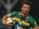 Ben Foden of Northampton runs with the ball during the Aviva Premiership match between Northampton Saints and Gloucester on September 5, 2014