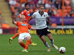 Blackpool secure first point of season