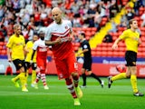 Yoni Buyens of Charlton celebrates scoring the first goal during the Sky Bet Championship match between Charlton Athletic and Watford at The Valley on September 13, 2014