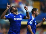 Diego Costa of Chelsea celebrates alongside Branislav Ivanovic as he scores their second goal during the Barclays Premier League match between Chelsea and Swansea City at Stamford Bridge on September 13, 2014