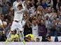 Real Madrid's Portuguese forward Cristiano Ronaldo celebrates after scoring during the Spanish league football match Real Madrid CF vs Club Atletico de Madrid on September 13, 2014