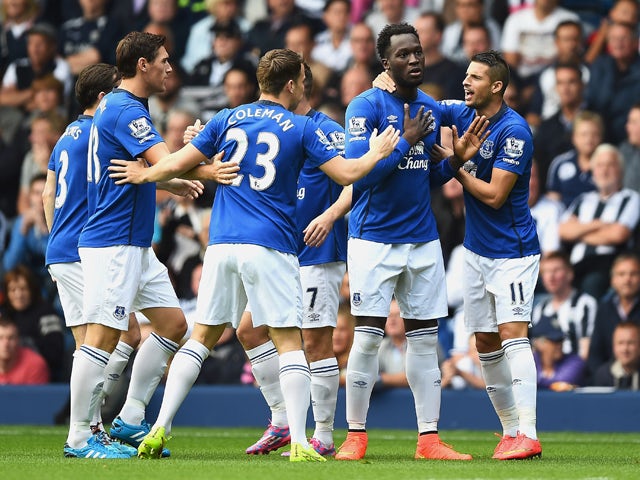 Romelu Lukaku of Everton celebrates scoring the opening goal with team mates during the Barclays Premier League match between West Bromwich Albion and Everton at The Hawthorns on September 13, 2014