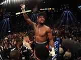 Floyd Mayweather Jr. celebrates after defeating Marcos Maidana by majority decision in their WBC/WBA welterweight unification fight at the MGM Grand Garden Arena on May 3, 2014