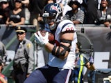 J.J. Watt #99 of the Houston Texans catches a one yard touchdown pass against the Oakland Raiders during the first quarter at O.co Coliseum on September 14, 2014