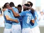 Stefano Mauri with his teammates of SS Lazio celebrates after scoring the third team's goal during the Serie A match between SS Lazio and AC Cesena at Stadio Olimpico on September 14, 2014