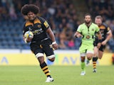 Ashley Johnson of Wasps breaks away to score the first try during the Aviva Premiership match between Wasps and Northampton Saints at Adams Park on September 14, 2014